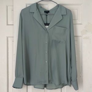 Blue blouse. Never worn. New with tags.